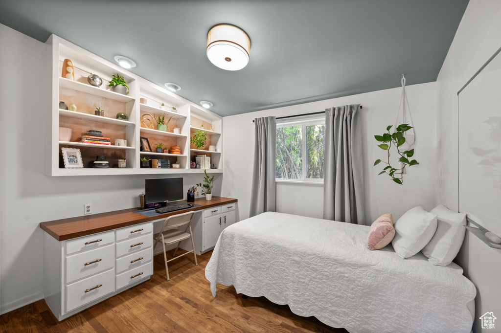 Bedroom featuring wood finished floors