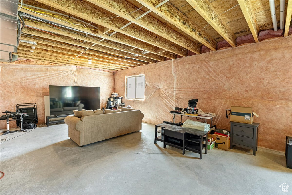 Living area featuring concrete flooring