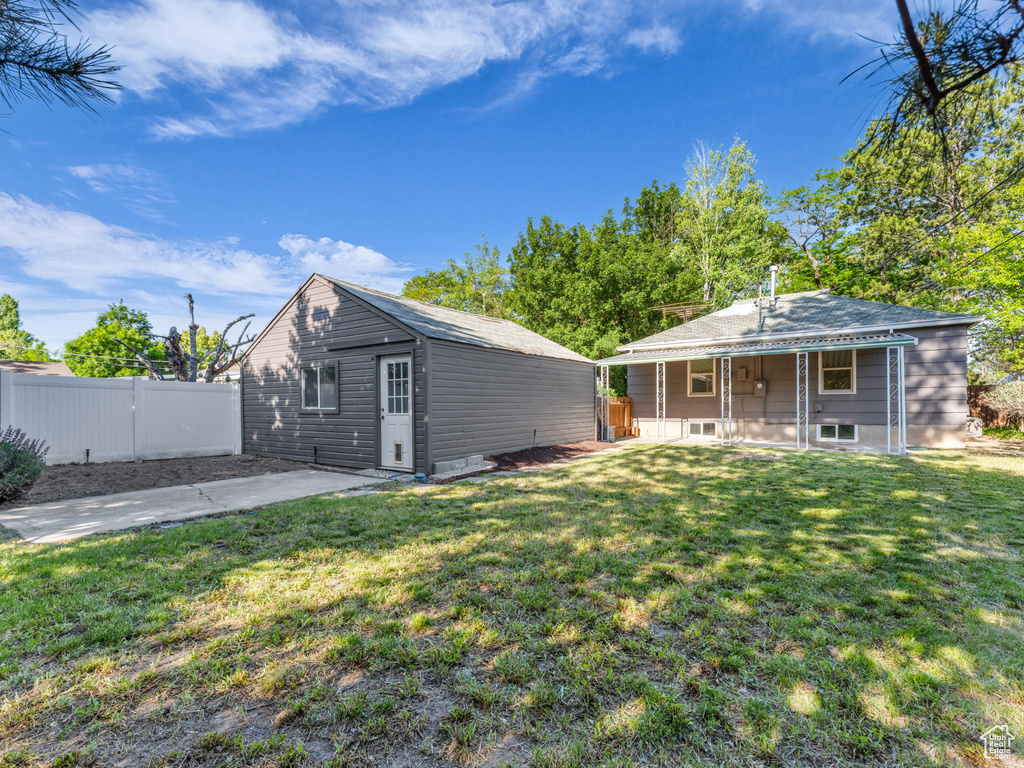 Rear view of house with covered porch