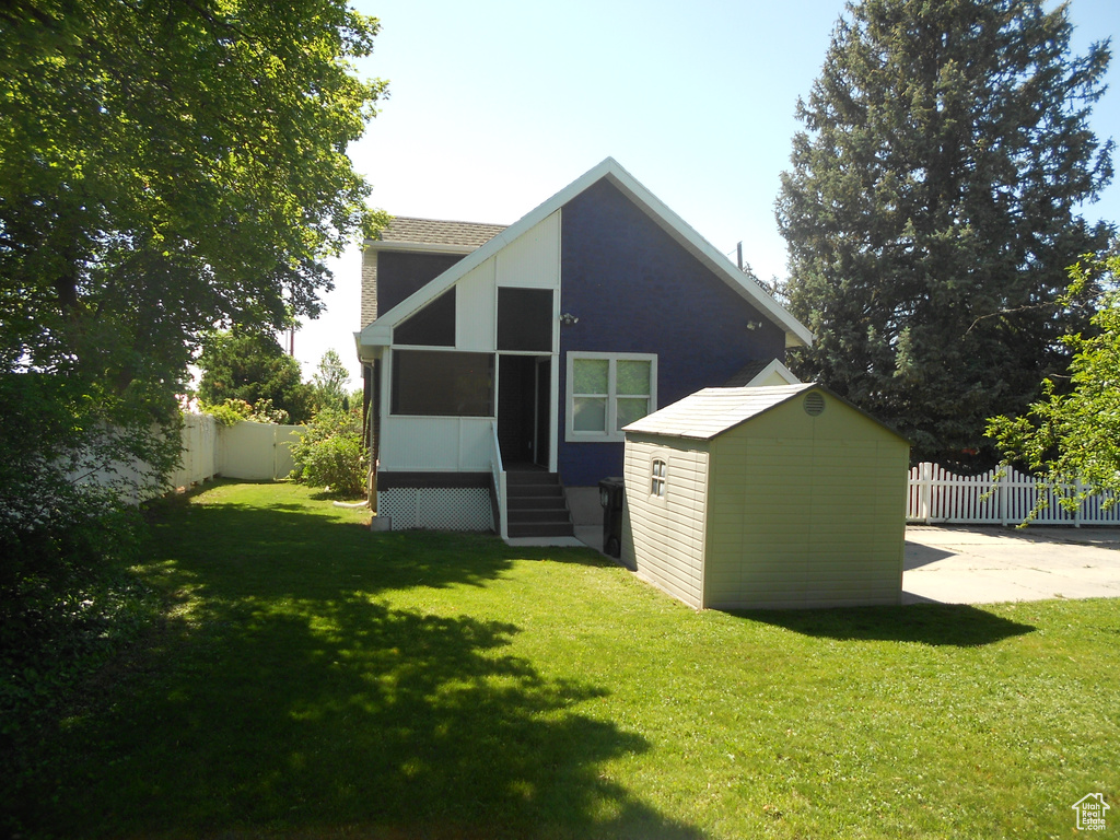 Rear view of house featuring entry steps