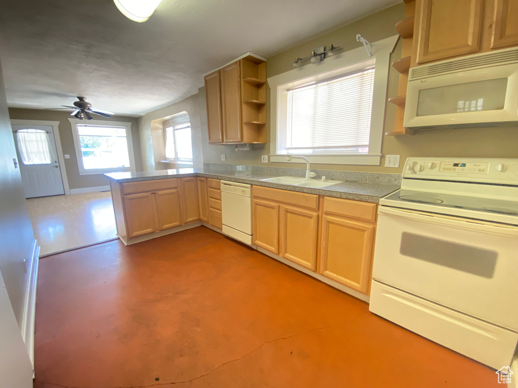 Kitchen featuring white appliances, open shelves, a sink, a peninsula, and ceiling fan