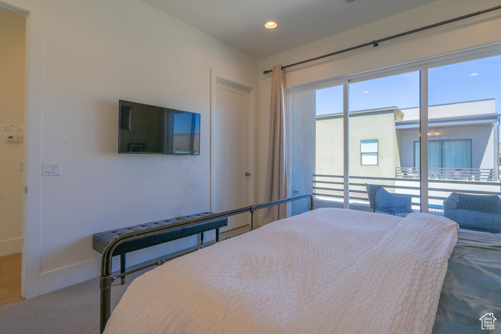Bedroom with recessed lighting and baseboards