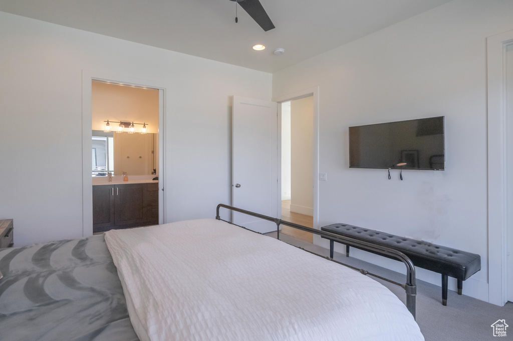 Bedroom featuring ensuite bathroom, carpet, recessed lighting, and ceiling fan