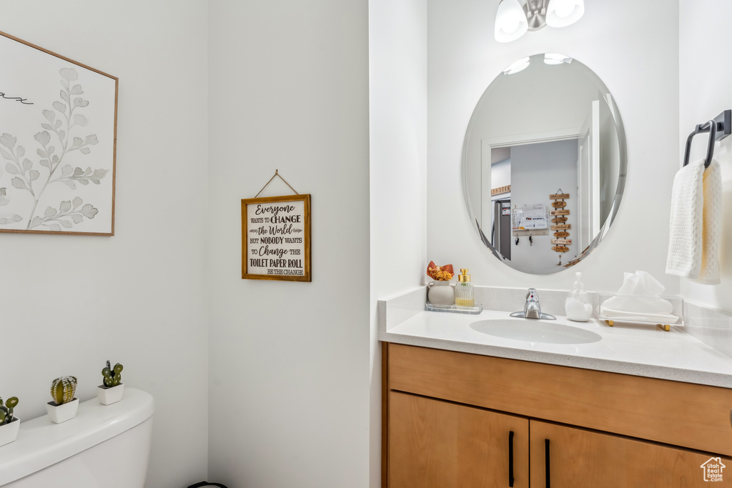 Bathroom with toilet and vanity