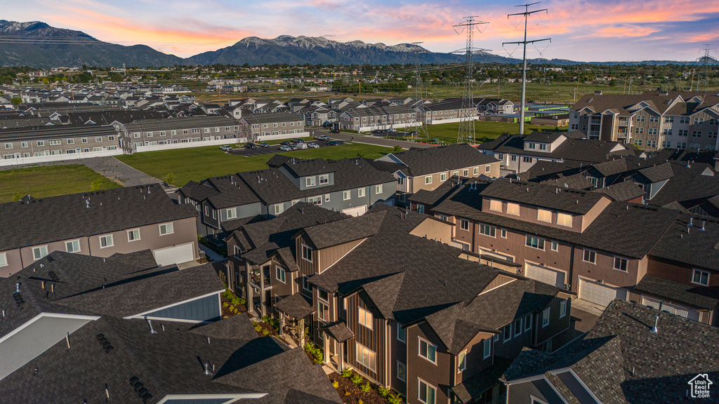Aerial view at dusk of a mountain view and a residential view