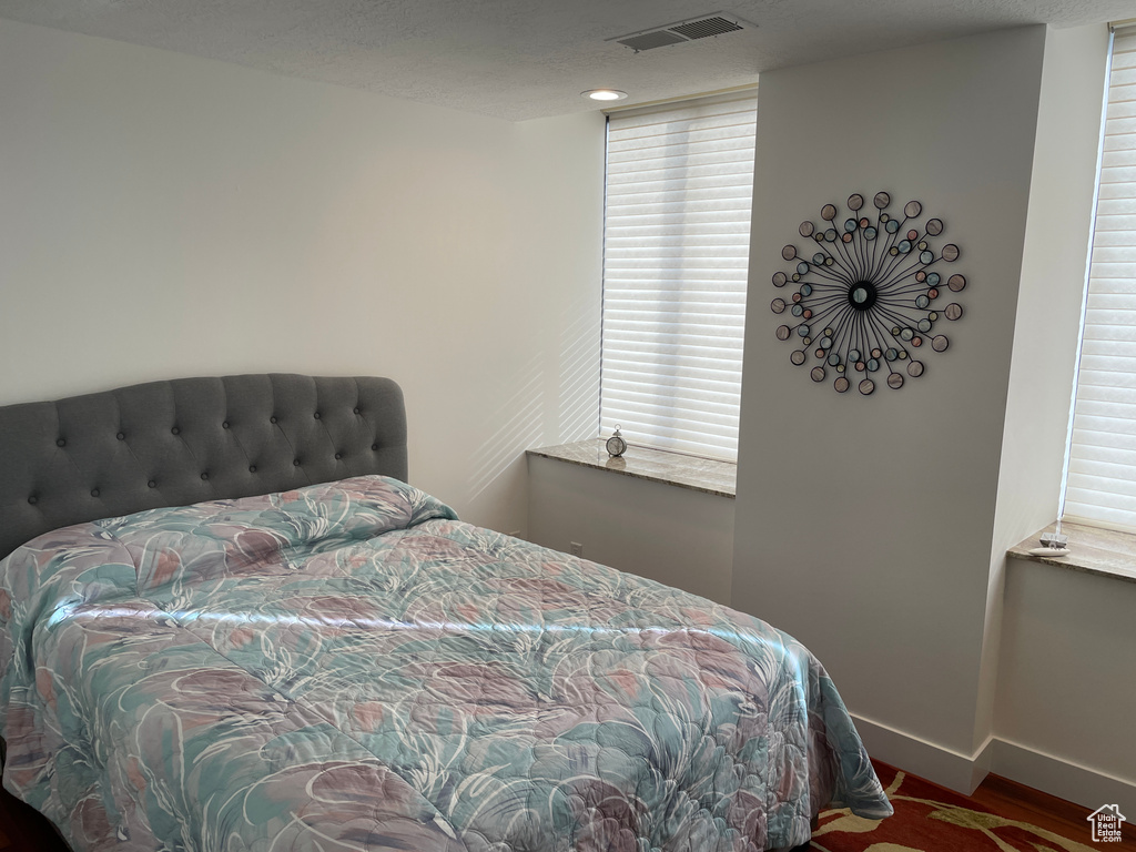 Bedroom featuring baseboards