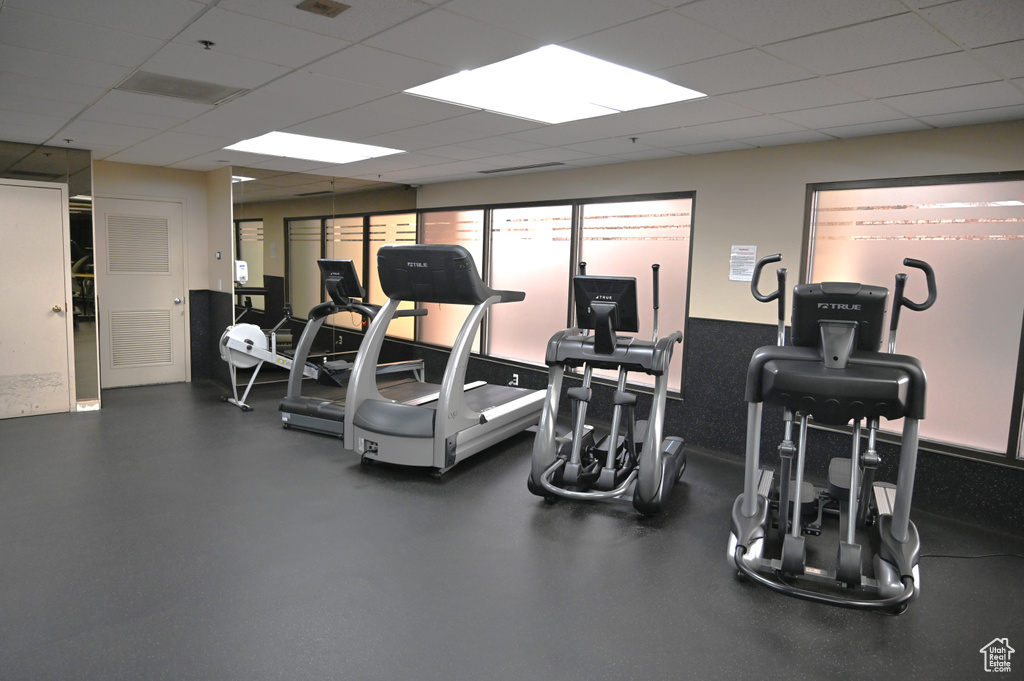 Gym featuring a paneled ceiling