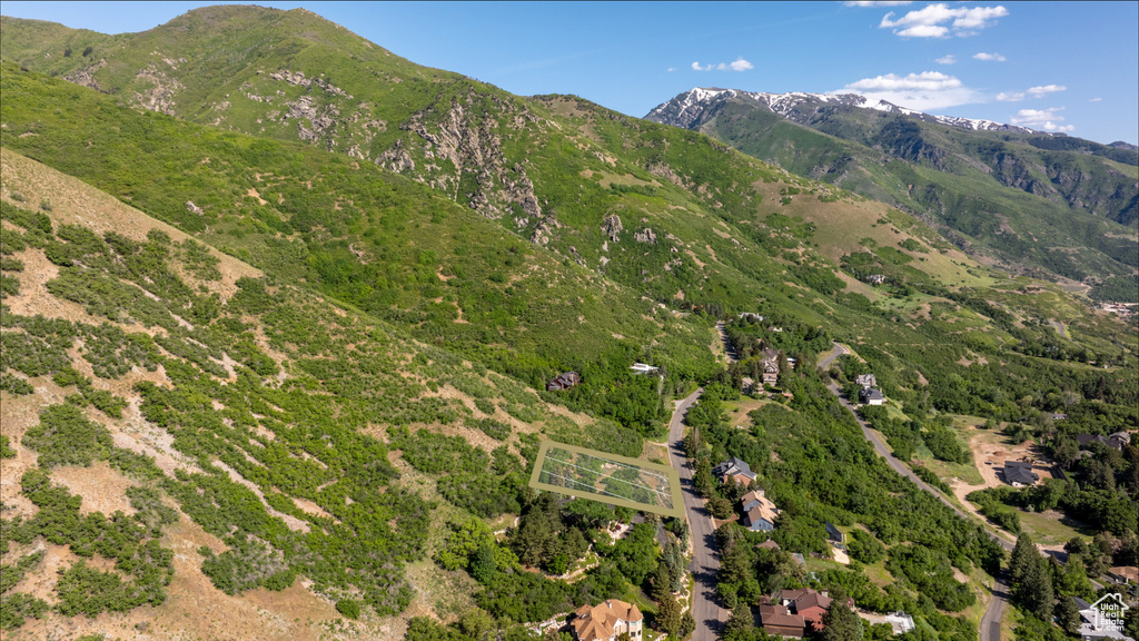 Aerial overview of property\'s location with mountains