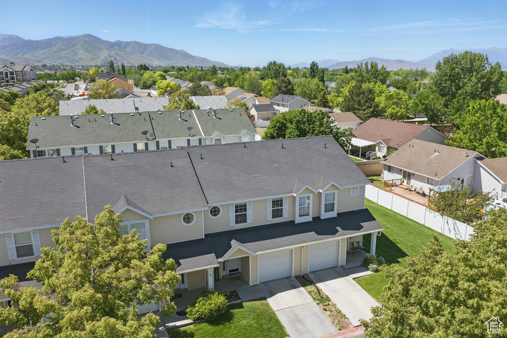 Aerial perspective of suburban area featuring mountains