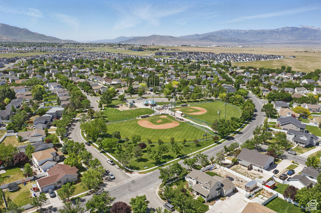 Aerial view of residential area with a mountain backdrop