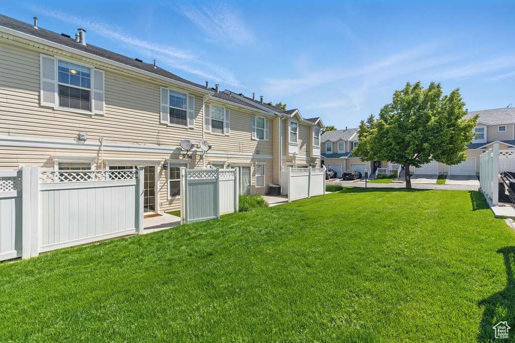 Rear view of property with a residential view