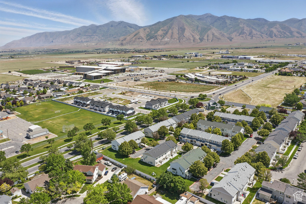 Aerial view of residential area with a mountain backdrop