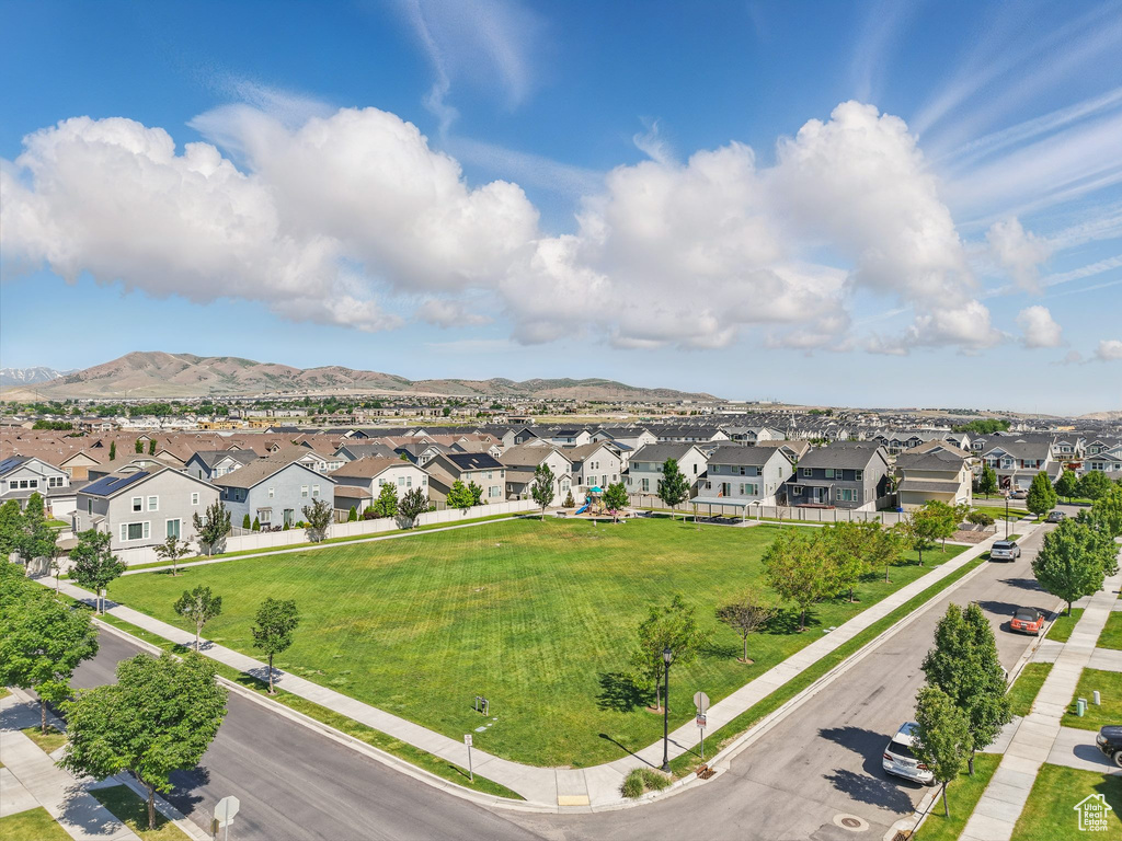 Aerial view of residential area with a mountain backdrop