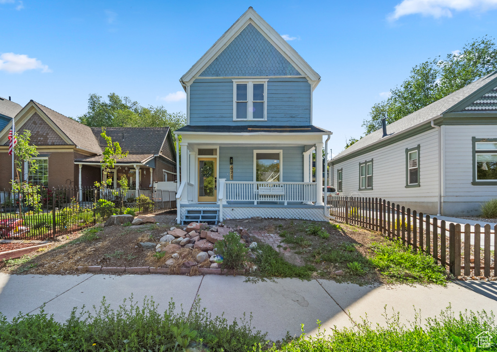 Victorian house featuring a porch