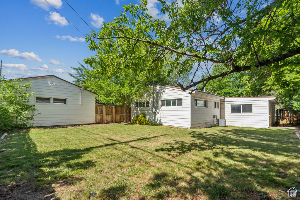 View of yard with central AC