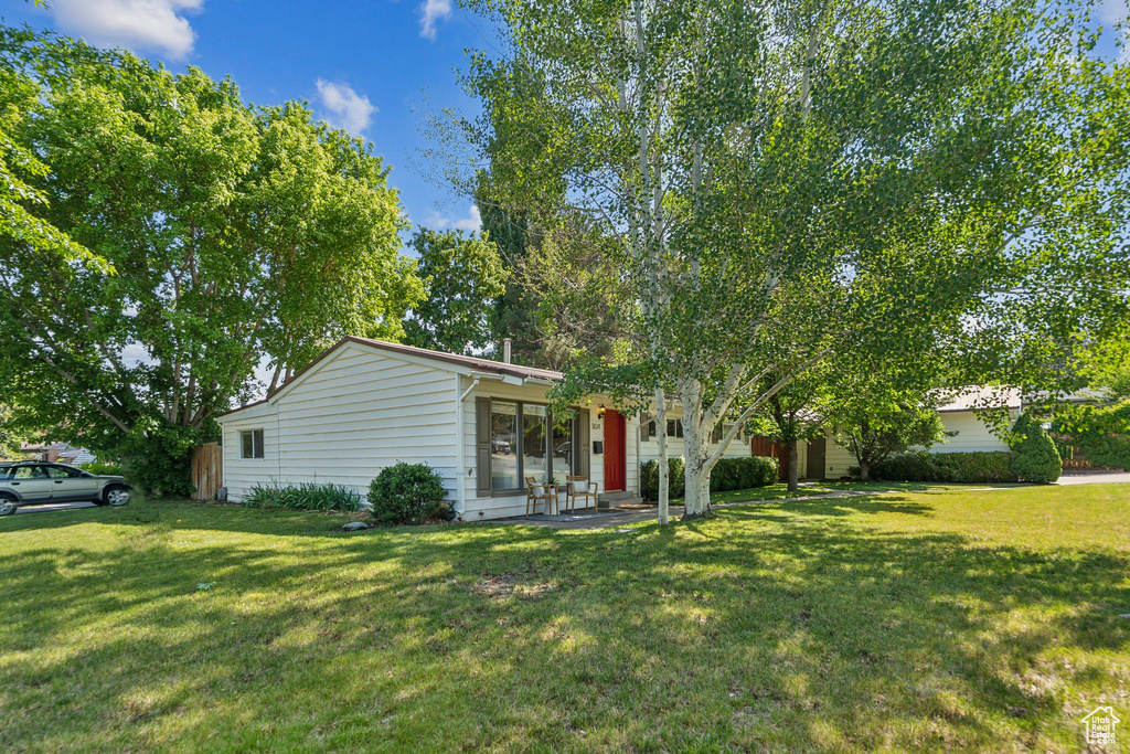 View of front of home with a front yard
