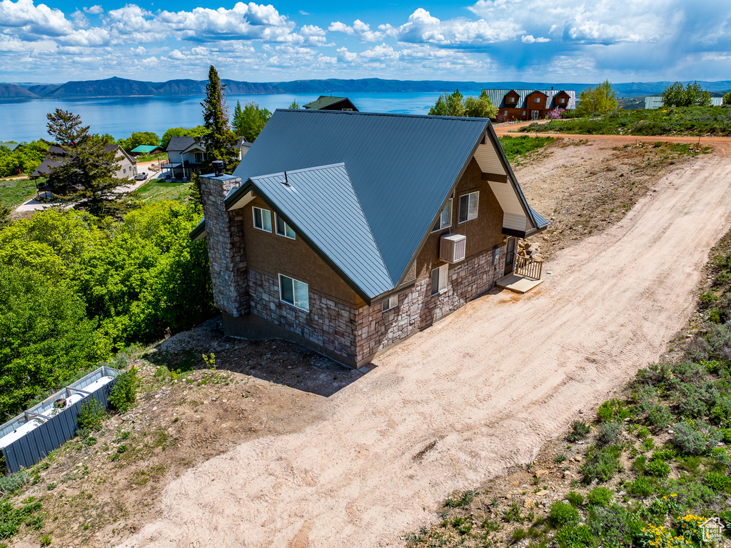 View of subject property featuring a large body of water