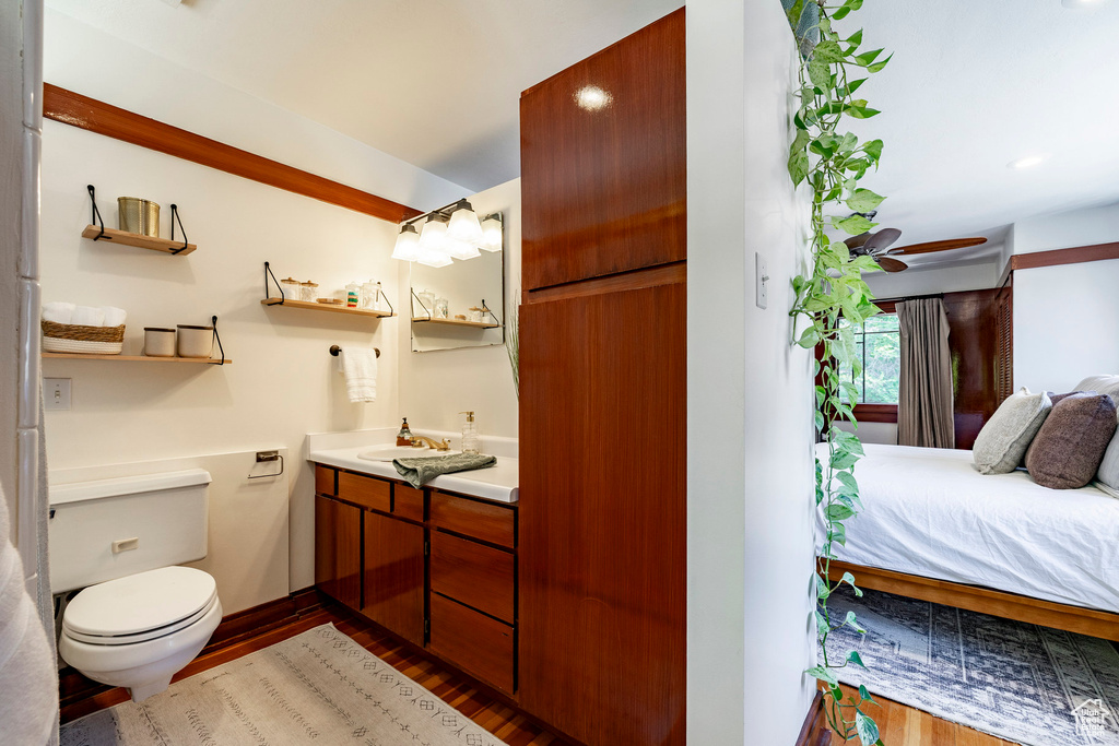 Bathroom featuring vanity and wood finished floors