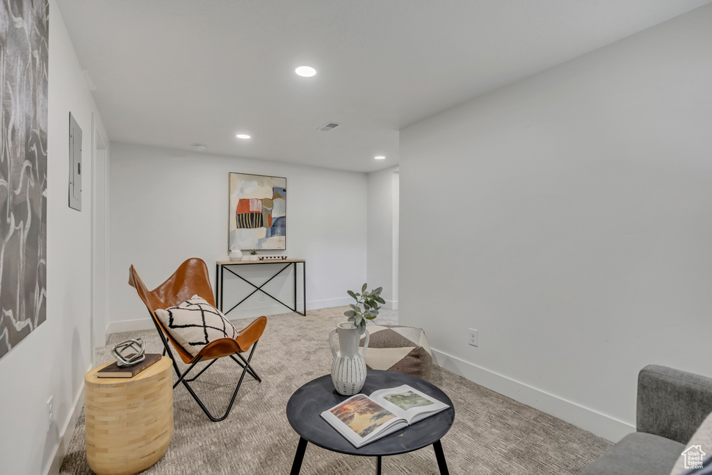 Sitting room with recessed lighting, baseboards, and carpet floors
