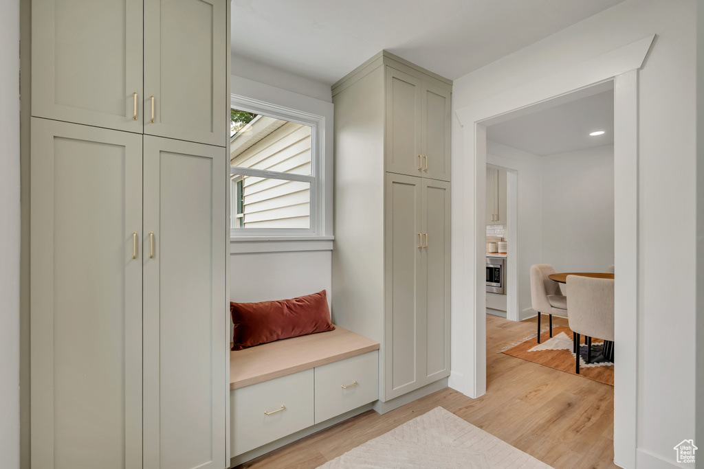 Mudroom featuring light wood-type flooring