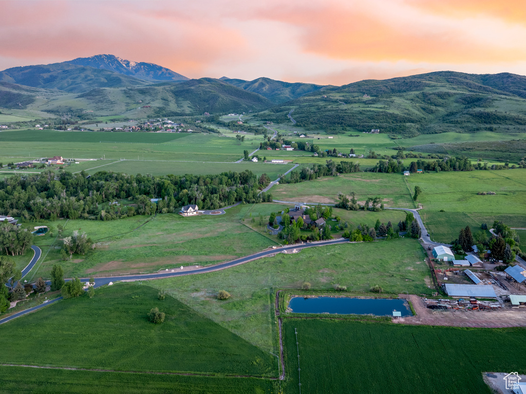 Aerial view at dusk of a view of countryside and a mountain view
