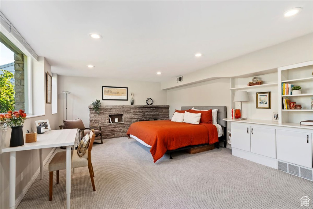 Bedroom featuring light colored carpet and recessed lighting