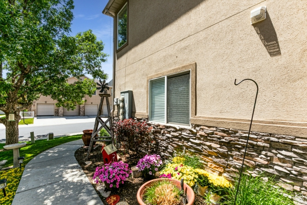 View of home's exterior featuring stucco siding