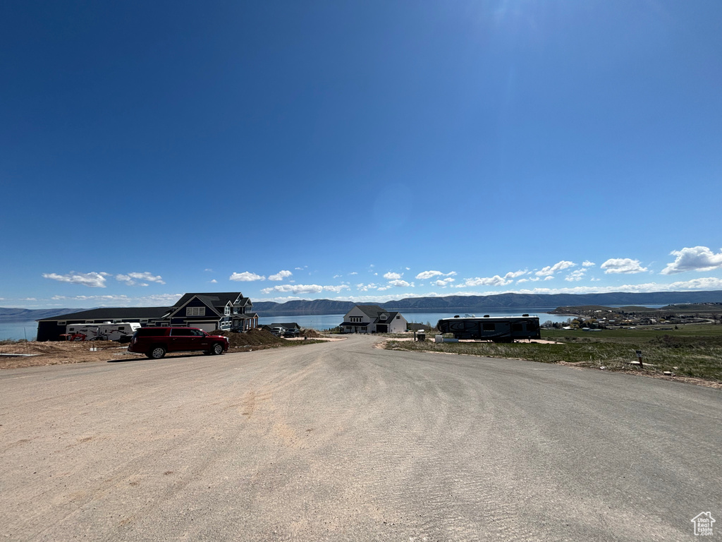 View of asphalt street with a water view