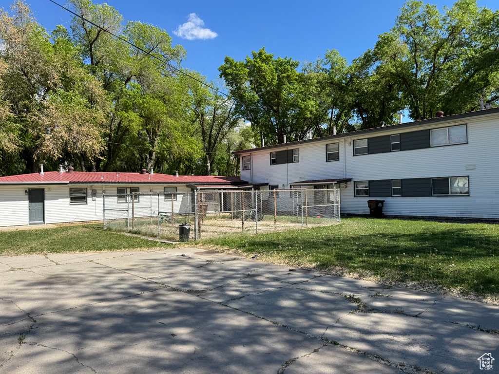 View of front of property with a gate