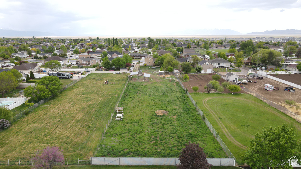 Aerial view of residential area with a mountain backdrop