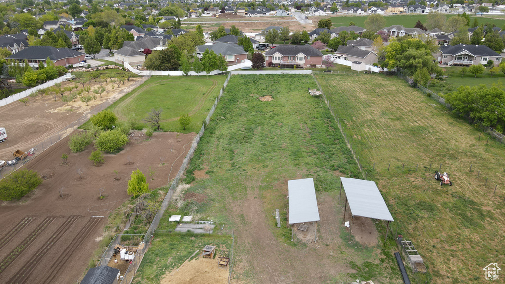 View of property location with nearby suburban area