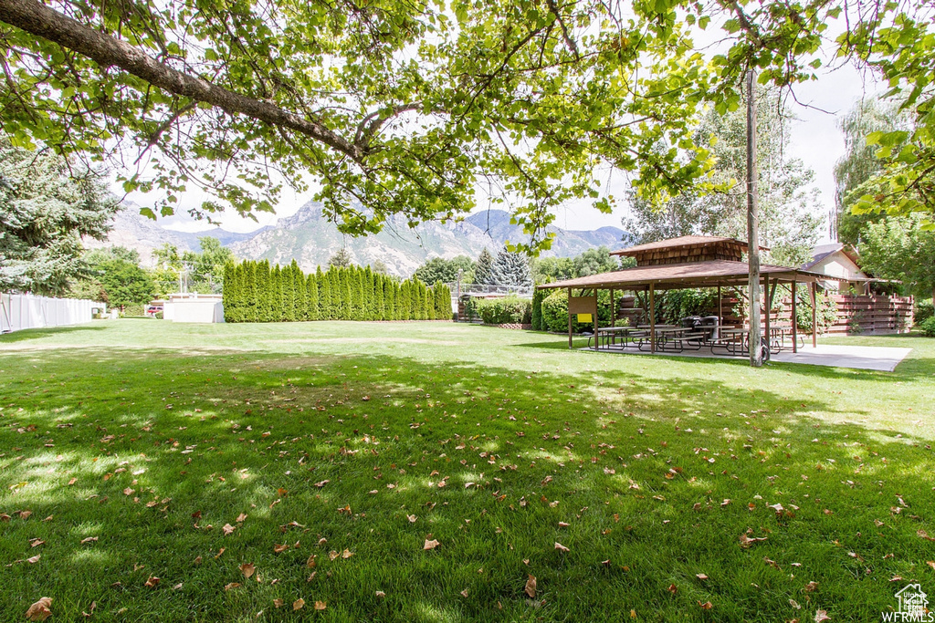 View of yard featuring a gazebo and a mountain view