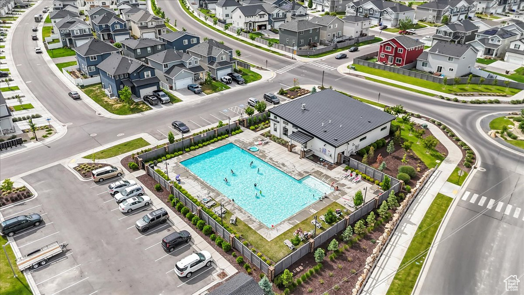 Aerial perspective of suburban area featuring a pool area