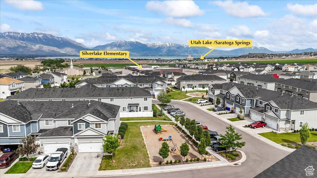 Aerial perspective of suburban area featuring mountains