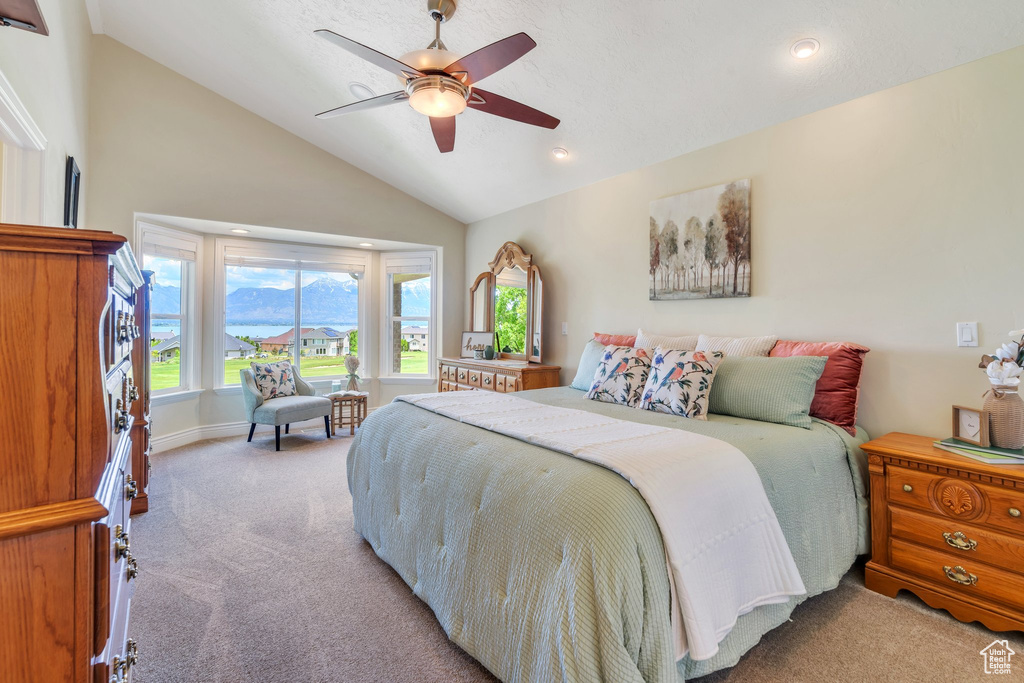 Bedroom featuring carpet, vaulted ceiling, ceiling fan, and recessed lighting