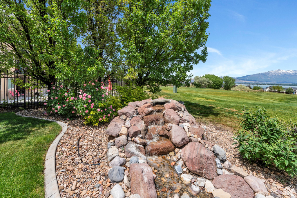 View of yard with a mountain view