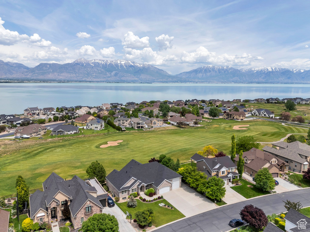 Aerial view of residential area featuring a water and mountain view