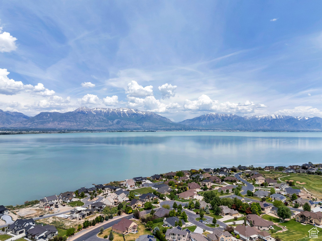 Aerial view of residential area with a water and mountain view