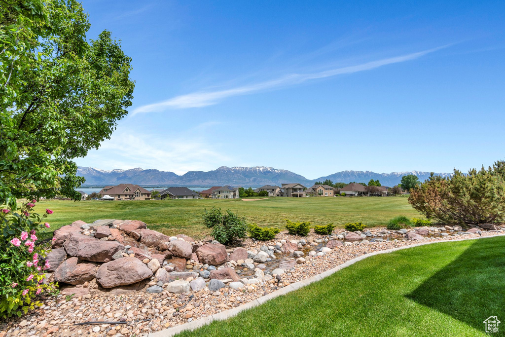 View of mountain background featuring nearby suburban area