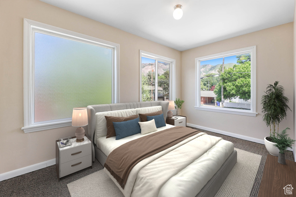 Bedroom featuring baseboards