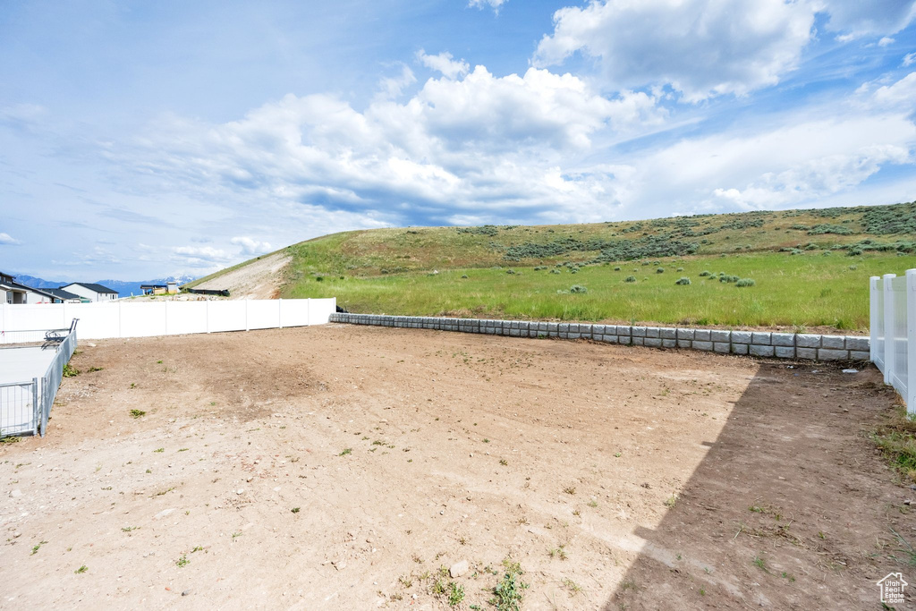 View of yard featuring an outdoor riding arena