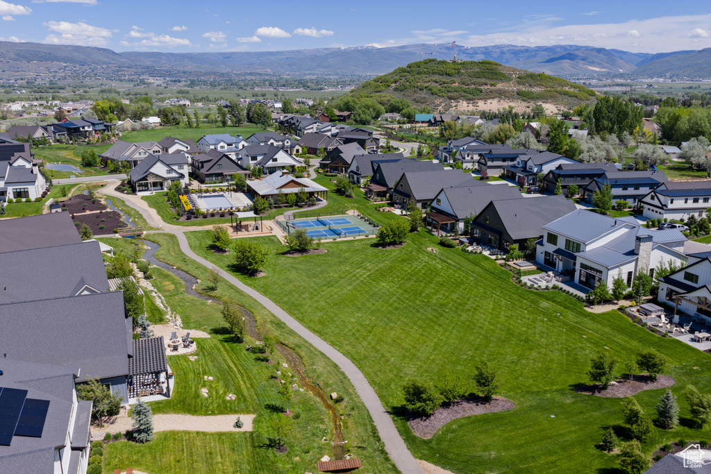 Aerial view of residential area featuring mountains