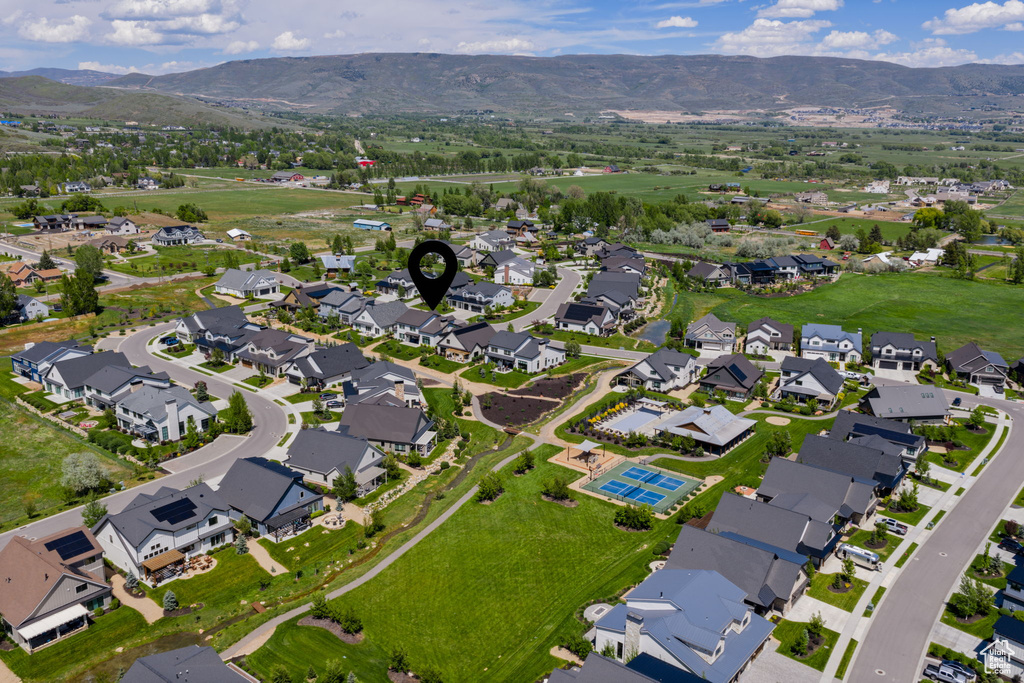 View of property location with a mountainous background and nearby suburban area