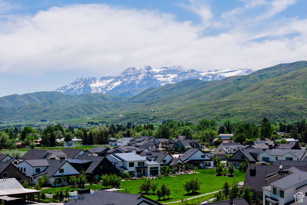 Mountain view featuring nearby suburban area
