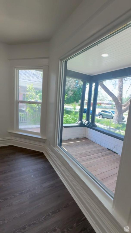 Detailed view of wood finished floors and baseboards