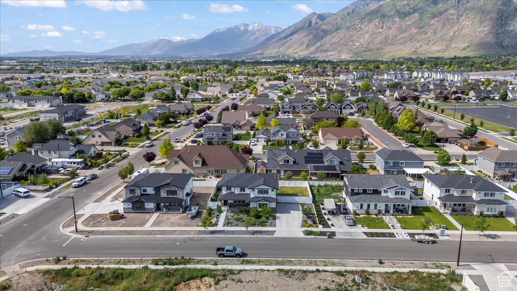 Aerial view of residential area with a mountain backdrop