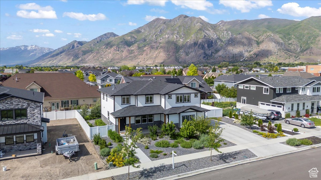 View of mountain background featuring nearby suburban area