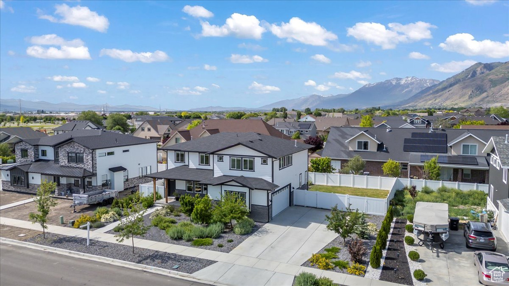 Aerial view of residential area with a mountain backdrop