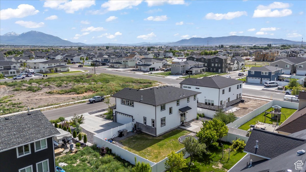 Aerial perspective of suburban area featuring mountains