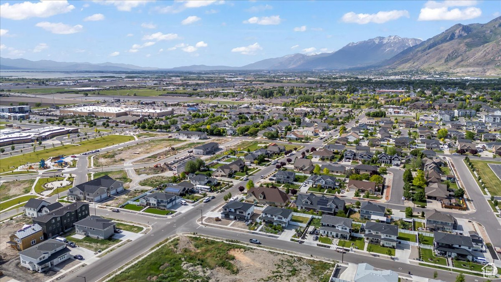 Aerial overview of property\\\\\\\'s location with mountains and nearby suburban area